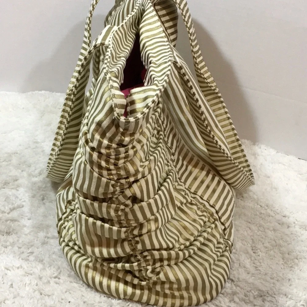 Bella Tunno gold/cream tote/diaper bag